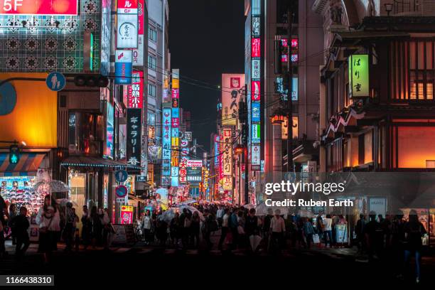 group of pedestrians on the streets of osaka - osaka prefecture 個照片及圖片檔