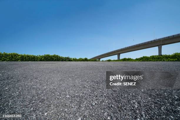 empty parking lot - gravel floor stock pictures, royalty-free photos & images