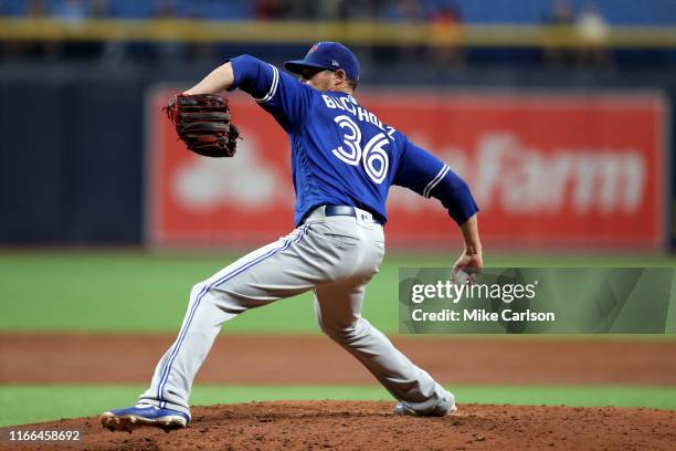 Clay Buchholz of the Toronto Blue Jays pitches during the game between the Toronto Blue Jays and the Tampa Bay Rays at Tropicana Field on Friday,...