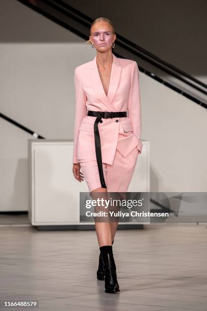 Model walks the runway at the Soeren Le Schmidt show during the Copenhagen Fashion Week Spring/Summer 2020 on August 06, 2019 in Copenhagen, Denmark.