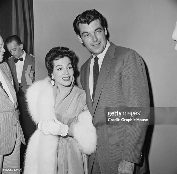 American actor Rory Calhoun with his wife, actress Lita Baron , circa 1955.