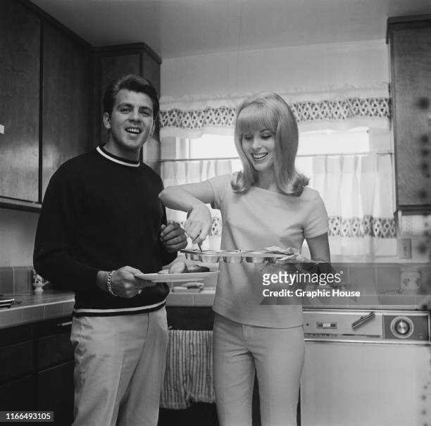 American singer and actor Fabian Forte at home with his wife Kathleen Regan, circa 1968.