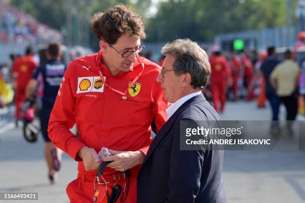 Ferrari's Team Principal Mattia Binotto speaks with Ferrari CEO Louis C. Camilleri after the qualifying session at the Autodromo Nazionale circuit in...