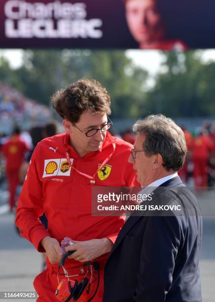 Ferrari's Team Principal Mattia Binotto speaks with Ferrari CEO Louis C. Camilleri after the qualifying session at the Autodromo Nazionale circuit in...