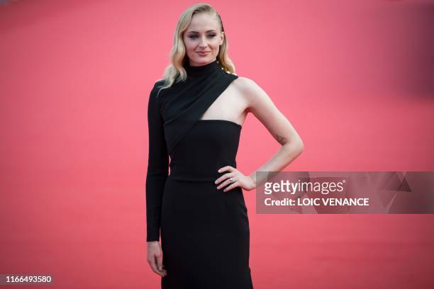 British actress Sophie Turner poses on the red carpet as she arrives for the movie "Heavy" as part of the 45th Deauville US Film Festival, in...