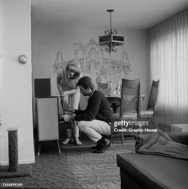 American singer and actor Fabian Forte at home with his wife Kathleen Regan, circa 1968.