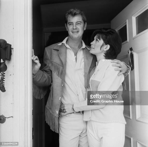 American actor Troy Donahue at home in Beverly Hills, California, with his wife Valerie Allen, circa 1967.