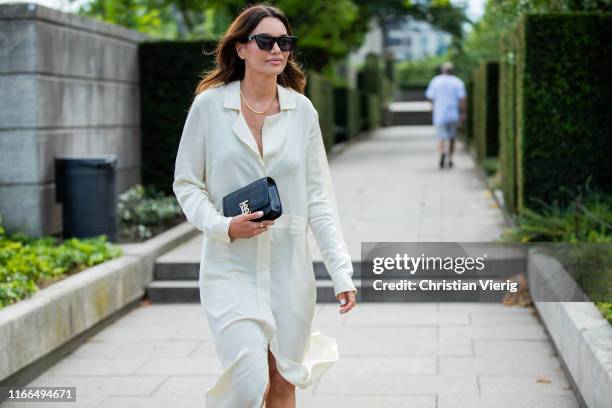 Funda Christophersen is seen wearing button up dress outside Mykke Hofmann during Copenhagen Fashion Week Spring/Summer 2020 on August 06, 2019 in...