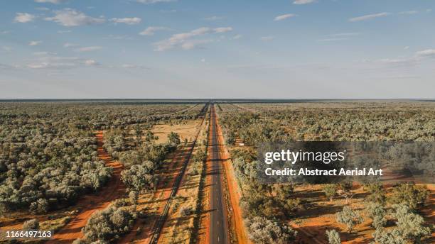 outback highway as seen from an aerial perspective, western australia - western australia road stock pictures, royalty-free photos & images