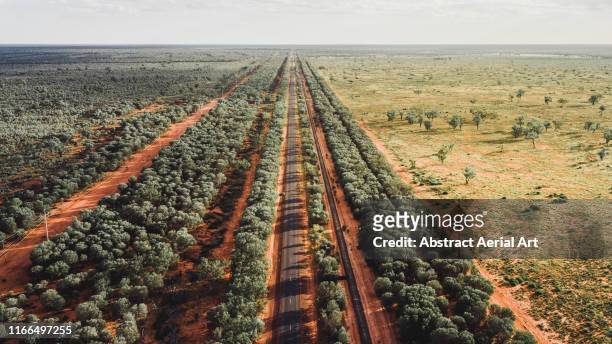 aerial perspective of an outback road, western australia - australia occidental fotografías e imágenes de stock
