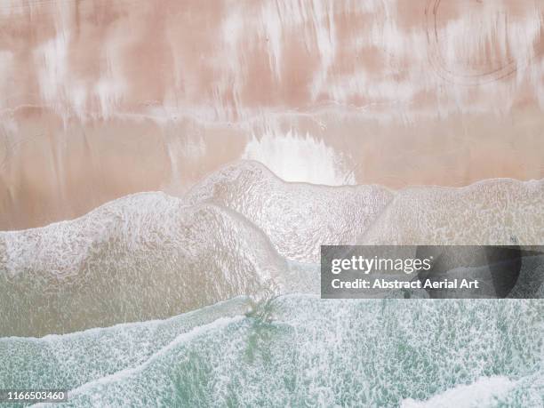 drone shot looking down onto cable beach, broome, australia - western australia coast stock pictures, royalty-free photos & images