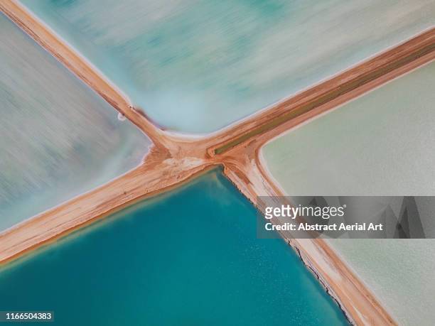 aerial view at the centre of four salt ponds, western australia - salt mineral stock-fotos und bilder