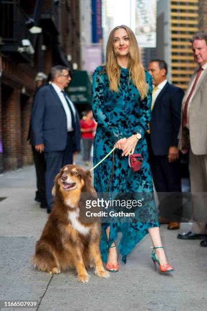 Amanda Seyfried and her dog Finn attend the Last Show with Stephen Colbert in Midtown on August 06, 2019 in New York City.