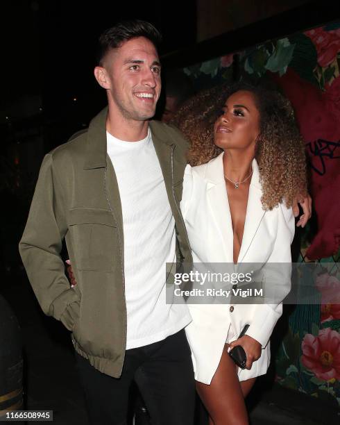 Greg O'Shea and Amber Gill seen on a night out at The Ivy Soho Brasserie on August 06, 2019 in London, England.