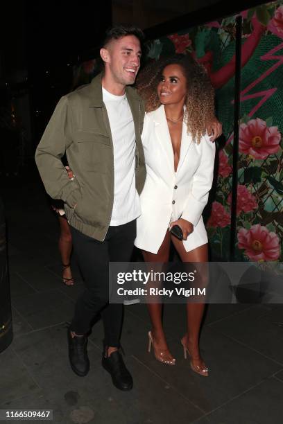 Greg O'Shea and Amber Gill seen on a night out at The Ivy Soho Brasserie on August 06, 2019 in London, England.