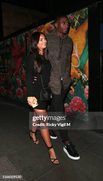 India Reynolds and Ovie Soko seen on a night out at The Ivy Soho Brasserie on August 06, 2019 in London, England.