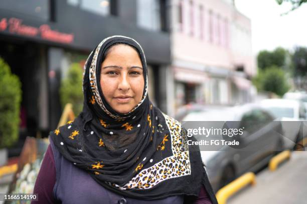 islam syrian woman portrait - refugee portrait stock pictures, royalty-free photos & images