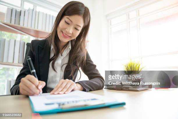 business worker signing the contract to conclude a deal - human body part stock pictures, royalty-free photos & images