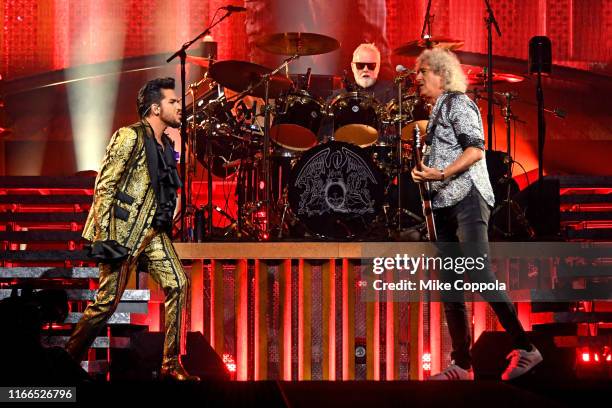 Singer Adam Lambert, drummer Roger Taylor, and guitarist Brian May of Queen + Adam Lambert perform at Madison Square Garden on August 06, 2019 in New...