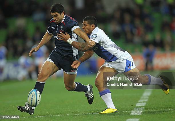 Mark Gerrard of the Rebels contests with David Smith of the Force during the round 18 Super Rugby match between the Rebels and the Force at AAMI Park...