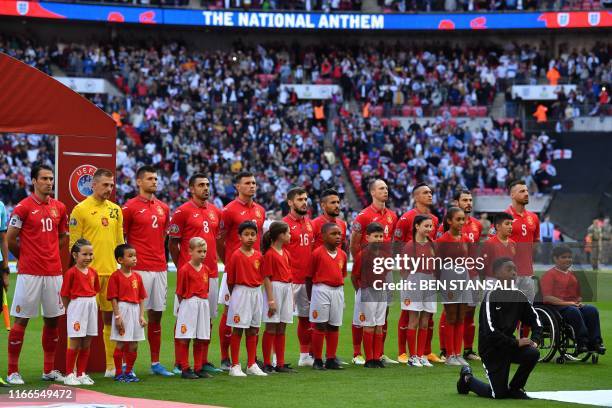 Bulgaria players Bulgaria's forward Ivelin Popov, Bulgaria's goalkeeper Plamen Iliev, Bulgaria's defender Strahil Popov, Bulgaria's midfielder Georgi...