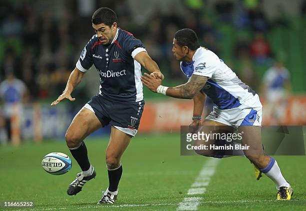 Mark Gerrard of the Rebels contests with David Smith of the Force during the round 18 Super Rugby match between the Rebels and the Force at AAMI Park...