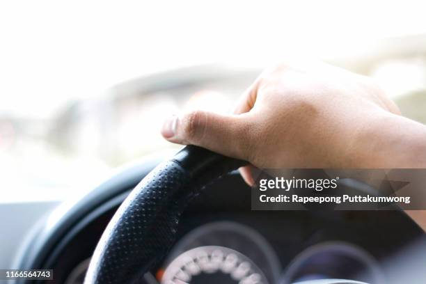 man driving car on highway. speed control and security distance on the road, driving safely - slow stock-fotos und bilder