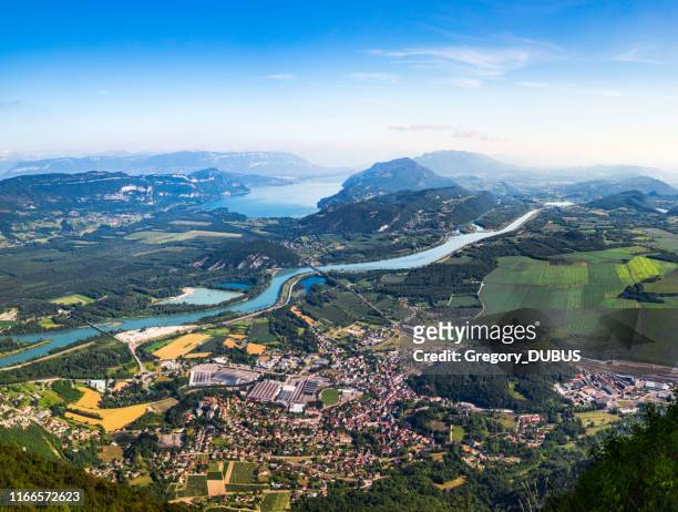 aerial view of beautiful french landscape in bugey mountains, in ain department auvergne-rhone-alpes region, with culoz small town, the rhone river and famous lake bourget in background in summer - rhone river stock pictures, royalty-free photos & images