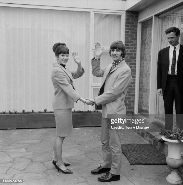 British drummer Ringo Starr of rock group the Beatles with his new bride, Maureen Cox, at a bungalow in Hove the day after their wedding, 12th...