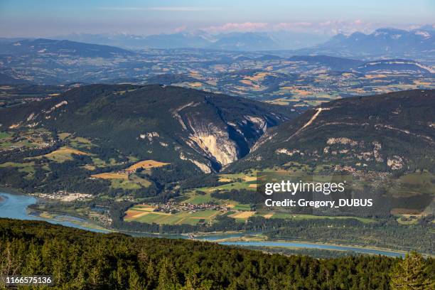 high point of view french hilly landscape on ain and jura departments from grand colombier mountain, with the end of day sunlight in summer in european alps - rhone river stock pictures, royalty-free photos & images