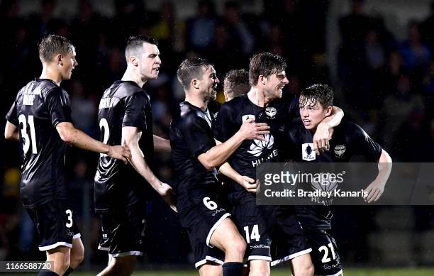 Callum McCowatt of the Phoenix celebrates scoring a goal during the FFA Cup Round of 32 match between the Brisbane Strikers and Wellington Phoenix at...