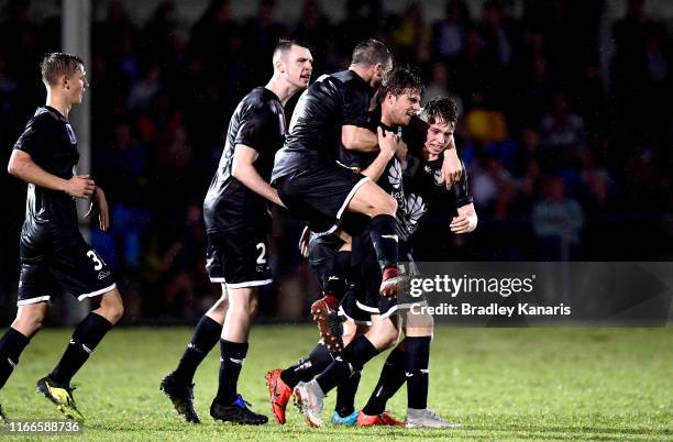 Callum McCowatt of the Phoenix celebrates scoring a goal during the FFA Cup Round of 32 match between the Brisbane Strikers and Wellington Phoenix at...