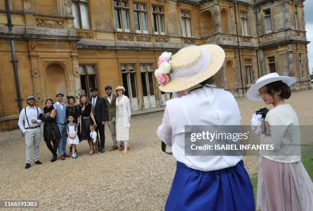 Visitors attend a 1920's themed event at Highclere Castle, near Newbury, west of London, on September 7 ahead of the world premiere of the Downton...