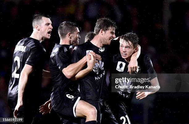 Callum McCowatt of the Phoenix celebrates scoring a goal during the FFA Cup Round of 32 match between the Brisbane Strikers and Wellington Phoenix at...