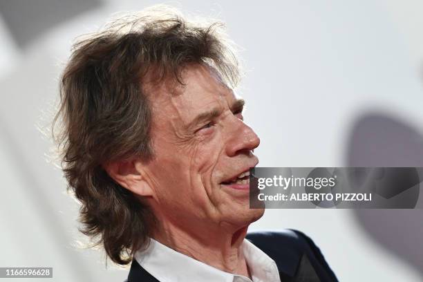 English singer, songwriter and actor Mick Jagger arrives for the screening of the film "The Burnt Orange Heresy" during the closing night of the 76th...