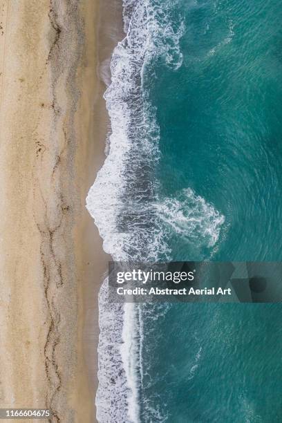 drone view of a beach and the mediterranean sea, liguria, italy - liguria stock pictures, royalty-free photos & images