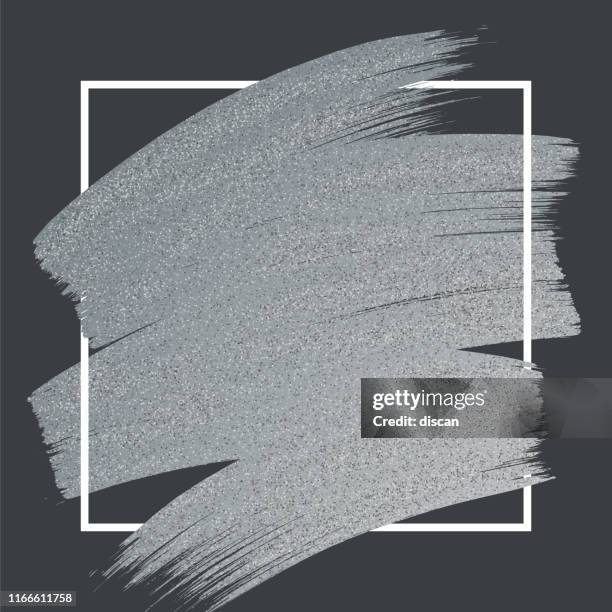 silber glitter farbe pinselstrich mit rahmen auf schwarzem hintergrund. - silver-glitter-white-background stock-grafiken, -clipart, -cartoons und -symbole