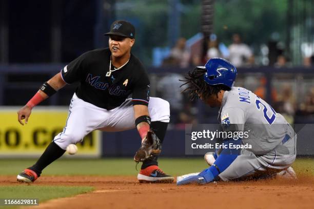 Adalberto Mondesi of the Kansas City Royals steals second base in the third inning against the Miami Marlins at Marlins Park on September 7, 2019 in...