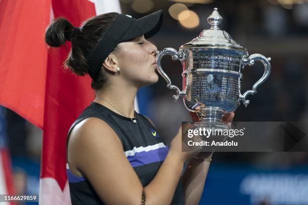 Bianca Andreescu of Canada poses with the trophy after her US Open Championships women's singles final match against Serena Williams of USA at Billie...