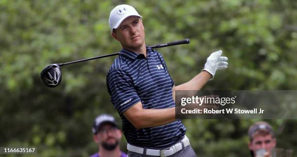 American professional golfer Jordan Spieth loses his driver after he tees off during the first round of the Travelers Open, Cromwell, Connecticut,...