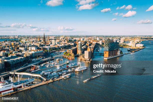 aerial view of hamburg hafen city over blue harbour - port of hamburg stock pictures, royalty-free photos & images