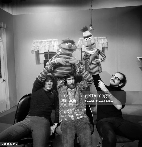 Puppeteers Daniel Seagren holding and Jim Henson working Ernie and Frank Oz with Bert rehearse for an episode of Sesame Street at Reeves TeleTape...