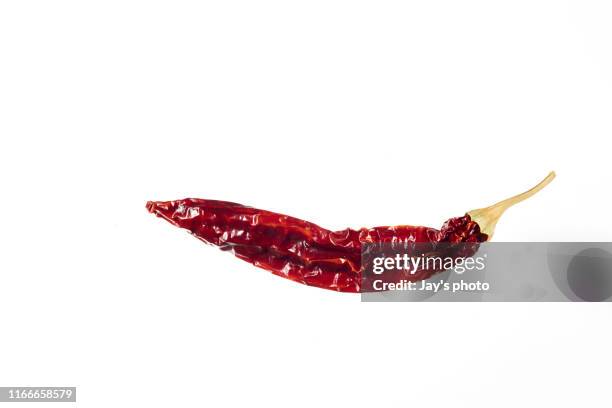 red chili pepper isolated on white background stock photo - dried food stock pictures, royalty-free photos & images