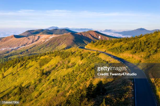 beautiful landscape view of mount shirane at japan's highest national highway point in gunma, japan - gunma prefecture imagens e fotografias de stock