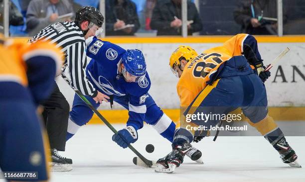 Peter Abbandonato of the Tampa Bay Lightning faces off against Thomas Novak of the Nashville Predators during an NHL Prospects game at Ford Ice...