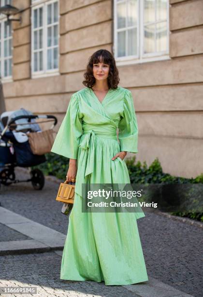 Alyssa Coscarelli is seen wearing green dress Rodebjer outside Helmstedt during Copenhagen Fashion Week Spring/Summer 2020 on August 07, 2019 in...