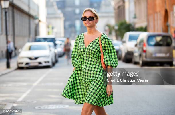 Claire Rose Cliteur is seen wearing green plaid dress outside Helmstedt during Copenhagen Fashion Week Spring/Summer 2020 on August 07, 2019 in...