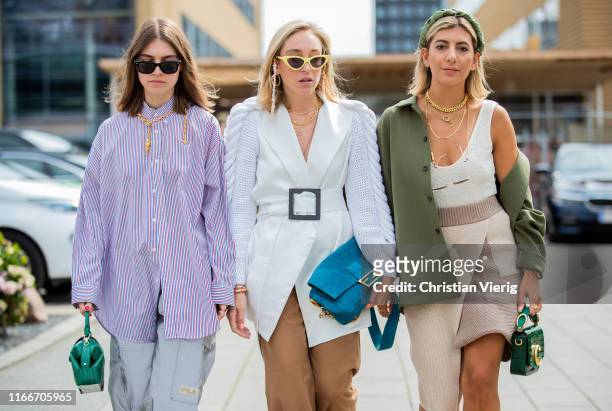 Guests seen outside Holzweiler during Copenhagen Fashion Week Spring/Summer 2020 on August 07, 2019 in Copenhagen, Denmark.