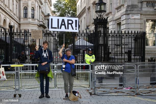 Anti-Brexit demonstrators hold 'Liar' banner in front of Downing Street, London, England on Saturday, September 7, 2019. The protests took place amid...