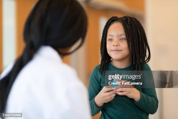 Child Using Puffer Child Inhaler Black Photos and Premium High Res Pictures - Getty Images
